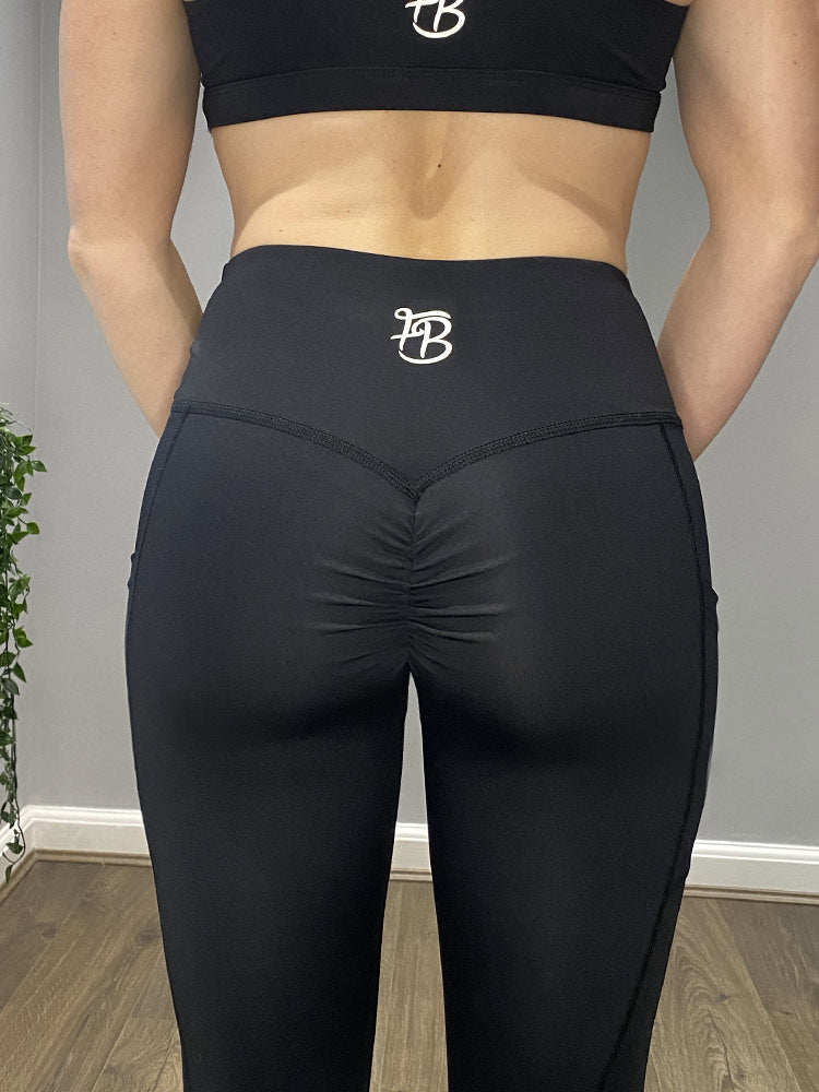 https://www.fitboutique.co.uk/cdn/shop/products/black-scrunch-leggings-bum_2048x.jpg?v=1635502233